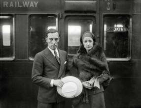Silent film star Buster Keaton with his wife Natalie Talmadge, sister of film stars Constance and Norma Talmadge, circa 1930. File Reference # 34145-684THA