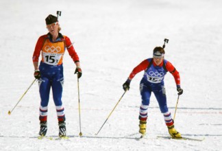 Competing in the Biathlon event, World class athlete Sergeant Kristina Sabasteanski, USA, (right) takes off for her anchor leg of the women's 4 X 7.5km Relay competition in the 2002 OLYMPIC WINTER GAM...