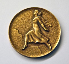 This medal from the 1948 Winter Olympics in St. Moritz was created by Huguénin. It commemorates the winter sports competition held in Switzerland during the post-war period.