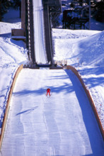Ski Jumper jumping on Ski Jump at Whistler Olympic Park - Site of Vancouver 2010 Winter Olympics Games British Columbia Canada