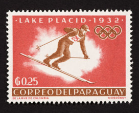 Postage stamp from Paraguay depicting a downhill skier in the 1932 Winter Olympics in Lake Placid, New York.