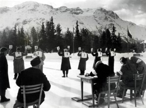 Jan 31, 1948; St. Moritz, SWITZERLAND; Judges hold up the score cards while judging in the Women's Singles Skating Championships during the 1948 St. Moritz Winter Olympics. (Credit Image: © KEYSTONE P...