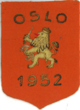 The 'Nederlands embleem' from the Oslo 1952 Olympics depicts the Dutch emblem used during the event. It represents the Netherlands' participation in the 1952 Winter Olympics in Oslo, showcasing the na...