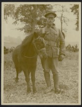 The front in France Description: The mascot of the K. R. Rifles Annotation: The front in France. Soldier of K. R. [King's Regulations] Rifles with their mascot, a pony Date: {1914-1918} Location: Fran...