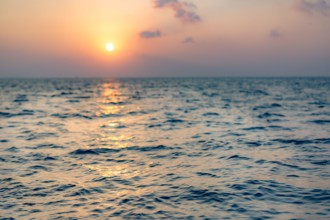Sea on beautiful sunset, seascape. Vivid twilight sunset sky and motion blur of the sea under with long exposure effect.