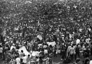 The Woodstock Music and Art Festival, a famous rock festival held at a dairy farm in Bethel, New York on August 15-17, 1969.