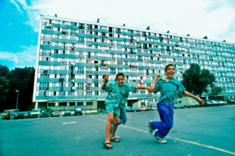 Montfermeil, France, Parisian 1960s Suburbs, low income Public Housing Projects, HLM Façade Young Immigrants Boys Playing in Yard, modern design 1960s