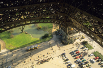 Eiffel Tower structure Paris, France. High view of parking lot or car park, from the elevator. Looking down to the ground. Overhead view.