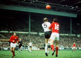 World Cup Final 1966 England 4 West Germany 2 at Wembley London Martin Peters heads ball as Geoff Hurst watches