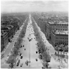 France,1950s. Aerial view of a wide tree-lined street or boulevard, near the Arc de Triomphe, Paris.