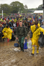 Isle of Wight, england, June 21 2012. Heavy rain and traffic congestion brings chaos to the Isle of Wight festival. Concert reve