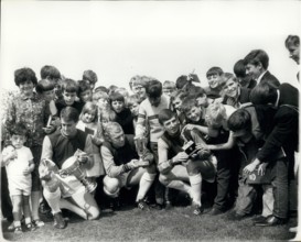 Aug. 17, 1966 - West Ham?s World Cup players show their trophies ? Taking time out from training at Chadwell Heat yesterday, West Ham?s three World Cup players show trophies to young fans. (L to R): G...