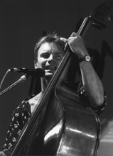 Jul. 04, 1991 - Sting The famous pop singer Sting is seen here at the acoustic bass during his concert at the 25th Jazz Festival of Montreux, July 2.
