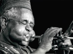 Jul. 07, 1990 - Jazz Festival of Montreux: His eyes shut and cheeks puffed out Dizzie Gillespie is all concentrated effort during the performance of his United Nation Orchestra at the Montreux Jazz Fe...