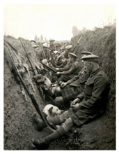 Historic image of WW1 Highland territorials and their mascot dog wait to 'go over the top' in a trench in Northern France