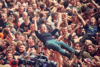 Kostrzyn, Poland - August 05, 2017: People having fun at a concert during the 23rd Woodstock Festival Poland.