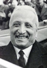. English: Enrico De Nicola (9 November 1877 – 1 October 1959) was an Italian jurist, journalist, politician, and the first provisional Head of State of the newborn republic of Italy from 1946 to 1948...
