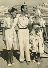 Italian actor Aldo Rubens and actress Wanda Osiris at the beach, Italy 1950s