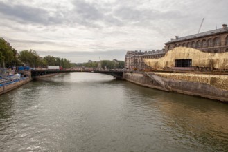 Preparation of the opening ceremony of the Paris 2024 Olympic Games in front of the Hotel Dieu hospital where there will be a dance show on a body of