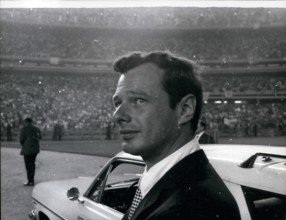 Dec. 16, 2011 - Brian Epstein takes an early look at the 100,000 crowd who were waiting for the Beatles at Shea Stadium, New York.