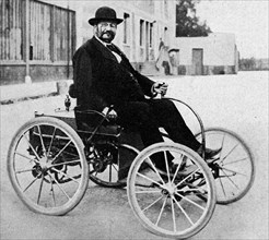 René Panhard in his 1893-type automobile