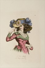 Femme coiffée du chapeau au tournesol