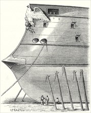 The front of a steam-propelled ironclad warship