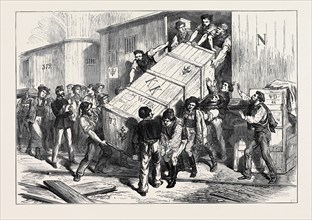 THE VIENNA UNIVERSAL EXHIBITION: UNLOADING A TRAIN OF GOODS, 1873