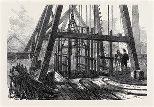 THE STAFFORDSHIRE COLLIERY: TOP OF THE SHAFT, AND CAGE FOR DESCENDING, 1873