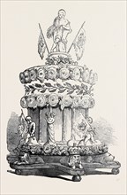 MARRIAGE OF LORD EDWARD FITZALAN HOWARD AND MISS TALBOT, THE BRIDAL CAKE