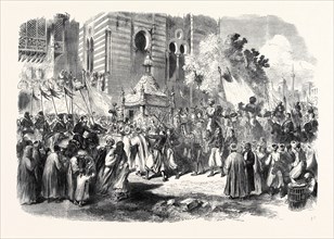 THE PRINCE AND PRINCESS OF WALES IN EGYPT: PROCESSION OF THE HOLY CARPET AT CAIRO, 1869
