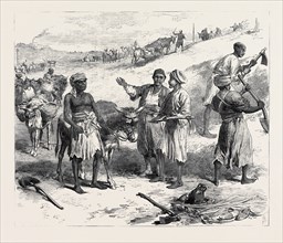 THE ISTHMUS OF SUEZ MARITIME CANAL: LABOURERS REMOVING EARTH, 1869