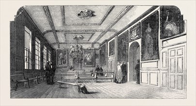 THE TOWN-HALL, WINDSOR; WITH THE PORTRAITS OF HER MAJESTY AND HIS ROYAL HIGHNESS PRINCE ALBERT,
