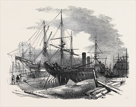 "THE INDUS" STEAMSHIP PARTLY DESTROYED BY FIRE, IN MESSRS. WIGRAM'S DRY DOCK, BLACKWALL, 1852