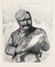 AFGHAN SKETCHES: A GOORKHA SHARPENING HIS KOOKREE, 1879