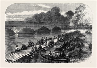 THE 1ST MIDDLESEX VOLUNTEER ENGINEERS THROWING A BARREL-PIER BRIDGE OVER THE SERPENTINE, 1867
