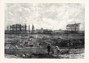 PROGRESS OF THE PARIS EXHIBITION BUILDING IN THE CHAMP DE MARS, FRANCE, 1866
