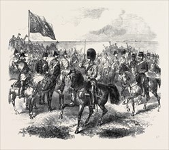 THE VOLUNTEER REVIEW AT BRIGHTON: THE PRINCE OF WALES PASSING THE SALUTING POINT AT THE HEAD OF THE