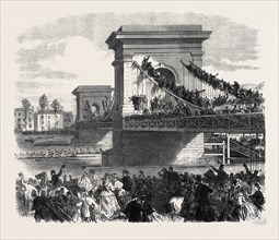 THE OXFORD AND CAMBRIDGE UNIVERSITY BOAT RACE: SCENE AT HAMMERSMITH BRIDGE, LONDON, UK, 1866