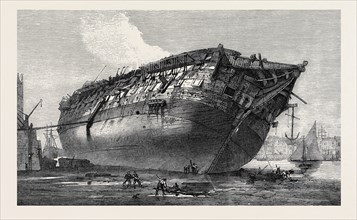 BREAKING-UP H.M.S. QUEEN AT ROTHERHITHE, 1871