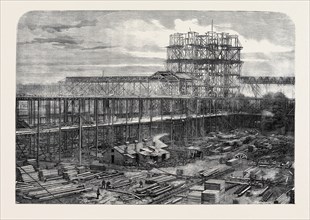 PROGRESS OF THE INTERNATIONAL EXHIBITION BUILDING: WORKS OF THE NAVE, EASTERN TRANSEPT, AND DOME,
