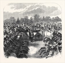 INSPECTION OF TROOPS AT ALDERSHOTT BY THE QUEEN: CAVALRY TROTTING PAST, 1868