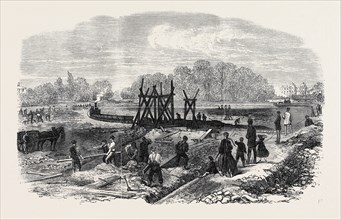 WORKS IN THE BED OF THE REGENT'S PARK LAKE, LONDON, 1868