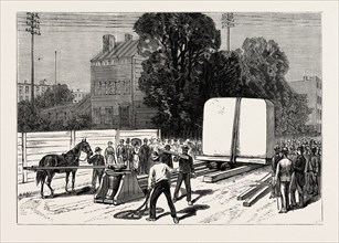NEW YORK: REMOVAL OF THE PEDESTAL OF THE OBELISK FROM THE WHARF TO THE SITE IN CENTRAL PARK