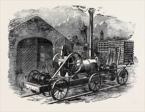 TUXFORD AND SONS' STEAM PILE-DRIVING ENGINE, WITH TWO DOUBLE ACTING PURCHASES FOR LIFTING FOUR RAMS