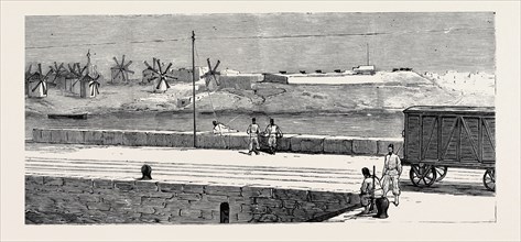 BEFORE THE BOMBARDMENT OF ALEXANDRIA, JULY 7, 1882: ISALE FORT, OR THE WINDMILLS, FROM THE P. & O.