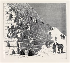 THE RECENT CAMPAIGN IN EGYPT: THE DUKE OF CONNAUGHT ASCENDING THE PYRAMID OF CHEOPS, CAIRO