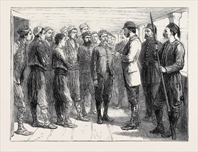 THE EASTERN QUESTION; AT NISCH: TAKING THE LIST OF SERVIAN PRISONERS CAPTURED BY THE TURKS