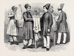BOMBAY BROKERS AND TRADERS: A "Brokers' room" of an English merchant in Bombay. On the staff of