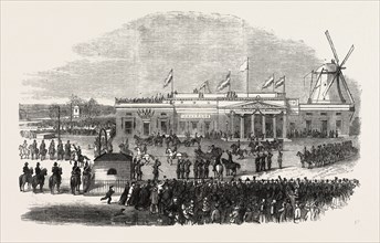 VISIT OF THE KING AND QUEEN OF HOLLAND TO AMSTERDAM: THEIR MAJESTIES LEAVING THE RAILWAY STATION